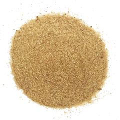 An overhead view of a pile of pumpkin spice vanilla sugar.